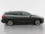 Ford Focus Wagon 1.0 EcoBoost Titanium Business | Trekhaak | HUD | Achteruitrijcamera | Winter Pack | Dodehoek detectie | Elektr. Achterklep | 12 maanden garantie! |