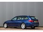 BMW 3-Serie Touring 318d Centennial High Executive | Trekhaak | Leder | Navi | PDC | Cruise | Rijklaar.