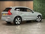 Volvo XC60 T6 AWD Recharge Plus Bright | Trekhaak | Adaptieve Cruise Control Stoelverwarming voor+achter | Stuurwielverwarming | Schuifdak | Parkeercamera | Pilot Assist | Elektrische voorstoelen geheugen | Lederen bekleding | Zitting verlenging voorstoelen | 19 Inch | Google Infotainment | Keyless Drive | Parkeersensoren voor+achter | Privacy Glass | Elektrisch bedienbare achterklep | DAB Radio | Apple Carplay/Android Auto | Draadloos telefoon opladen | Volvo On Call met mobiele App functie | Vapour Grey Metallic |