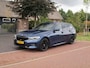 BMW 3-Serie Touring 318i High Executive | Camera | Sfeerverlichting | Apple Carplay | LED-Laser | NL-Auto |