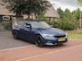 BMW 3-Serie Touring 318i High Executive | Camera | Sfeerverlichting | Apple Carplay | LED-Laser | NL-Auto |