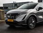 Nissan Ariya Evolve 91 kWh | SOH 99% | Panoramadak | Trekhaak | ACC | HUD | Voorstoelen verwarmd en geventileerd | Warmtepomp | 360 Camera | 19"