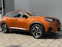 Peugeot e-2008 BWJ 2022 | EV 136PK Allure 50 kWh | LEDER/STOF | CLIMA | NAVI | CAMERA A | CARPLAY | PRIVACY GLASS | PDC |