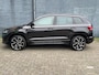 Skoda Karoq 1.5 TSI Automaat 150pk Sportline Business | Trekhaak 1500KG | Navi & Carplay | Digitaal Dashboard | Stoelverwarming | LED | Climatecontrol | Parkeerca