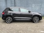 Skoda Karoq 1.5 TSI Automaat 150pk Sportline Business | Trekhaak 1500KG | Navi & Carplay | Digitaal Dashboard | Stoelverwarming | LED | Climatecontrol | Parkeerca