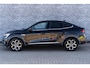Renault Arkana 1.6 E-Tech Hybrid 145 Intens | Trekhaak | Lederen Bekleding | Stoelverwarming | Elektrisch Verstelbare Voorstoelen | Achteruitrijcamera | Parkeersensoren | LED Koplampen | Keyless Entry | Navigatie Groot Scherm | Apple Carplay | Android Auto