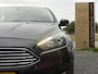 Ford Focus Wagon 1.0 Titanium 2e Eigenaar,Trekhaak,Navi,125pk,PDC V+A,6 Bak,Clima,Cruise,N.A.P,Lm velgen,Apk tot 04-2027