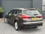 Ford Focus Wagon 1.0 Titanium 2e Eigenaar,Trekhaak,Navi,125pk,PDC V+A,6 Bak,Clima,Cruise,N.A.P,Lm velgen,Apk tot 04-2027