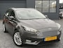 Ford Focus Wagon 1.0 Titanium 2e Eigenaar,Trekhaak,Navi,125pk,PDC V+A,6 Bak,Clima,Cruise,N.A.P,Lm velgen,Apk tot 04-2027
