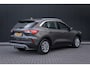 Ford Kuga 2.5 PHEV Titanium | 100% dealer o.h. | Trekhaak | Adaptieve cruise | Standkachel | Parkeercamera | Apple carplay / andriod auto
