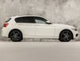 BMW 1-Serie 118i Centennial High Executive (NAVIGATIE, M STUUR, STOELVERWARMING, GETINT GLAS, SPORTSTOELEN, PARKEERSENSOREN, CRUISE, NIEUWSTAAT)