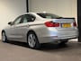 BMW 3-Serie 320i High Executive (GROOT NAVI, H&K AUDIO, STOELVERWARMING, CRUISE)