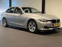 BMW 3-Serie 320i High Executive (GROOT NAVI, H&K AUDIO, STOELVERWARMING, CRUISE)