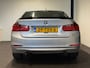 BMW 3-Serie 320i High Executive (GROOT NAVI, H&K AUDIO, STOELVERWARMING, CRUISE)
