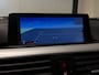 BMW 3-Serie 320i High Executive (GROOT NAVI, H&K AUDIO, STOELVERWARMING, CRUISE)