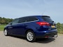 Ford Focus Wagon 1.0 Titanium | 1e Eigenaar | Apple CarPlay/Android Auto | Trekhaak | Navi | Clima | 16" Velgen | PDC | Cruise |