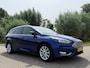 Ford Focus Wagon 1.0 Titanium | 1e Eigenaar | Apple CarPlay/Android Auto | Trekhaak | Navi | Clima | 16" Velgen | PDC | Cruise |
