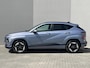Hyundai Kona Comfort Smart 65.4 kWh / Trekhaak afneembaar 750 kg / CCS snel laden / HUD / Stuur- en stoelverwarming / Navi / Apple Carplay Android / 18" LM wielen /