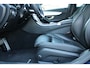 Mercedes-Benz C-klasse Estate 180 Business Solution AMG | Incl. 12 maanden garantie | Lederen sportstoelen | Cruise control | Climate control | Trekhaak | Zwarte hemel | LED Koplampen | 18" LM | Elektrische achterklep | Achteruitrijcamera | Dodehoek detectie |
