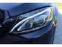 Mercedes-Benz C-klasse Estate 180 Business Solution AMG | Incl. 12 maanden garantie | Lederen sportstoelen | Cruise control | Climate control | Trekhaak | Zwarte hemel | LED Koplampen | 18" LM | Elektrische achterklep | Achteruitrijcamera | Dodehoek detectie |