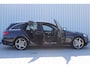 Mercedes-Benz C-klasse Estate 180 Business Solution AMG | Incl. 12 maanden garantie | Lederen sportstoelen | Cruise control | Climate control | Trekhaak | Zwarte hemel | LED Koplampen | 18" LM | Elektrische achterklep | Achteruitrijcamera | Dodehoek detectie |