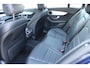 Mercedes-Benz C-klasse Estate 180 Business Solution AMG | Incl. 12 maanden garantie | Lederen sportstoelen | Cruise control | Climate control | Trekhaak | Zwarte hemel | LED Koplampen | 18" LM | Elektrische achterklep | Achteruitrijcamera | Dodehoek detectie |