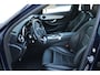 Mercedes-Benz C-klasse Estate 180 Business Solution AMG | Incl. 12 maanden garantie | Lederen sportstoelen | Cruise control | Climate control | Trekhaak | Zwarte hemel | LED Koplampen | 18" LM | Elektrische achterklep | Achteruitrijcamera | Dodehoek detectie |