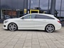 Mercedes-Benz CLA Shooting Brake 180 OrangeArt Edition | Schuifdak | Sportstoelen | Camera + Sensoren | Navi | Tel