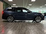 Volvo XC90 T8 AWD Recharge Ultra Executive Edit. | Full Option! | Bowers & Wilkins | Luchtvering | Stoelventilatie | Trekhaak | 360 Camera | Head-Up Display | Stoelmassage | 455pk | Adaptieve Cruise Control | Stoelverwarming voor+achter | Stuurwielverwarming | Schuifdak | 22 Inch | Full LED  Meesturende koplampen | Gelamineerde/geluidwerende zijruiten | Pilot Assist | BLIS Dode Hoek Detectie | Alcantara hemelbekleding | Lederen handgrepen en zonnekleppen | Elektrische voorstoelen geheugen | Nappa Lederen bekleding | Zitting verlenging voorstoelen | Lederen Dashboard | Google Infotainment | Keyless Drive | Parkeersensoren voor+achter | Privacy Glass | Elektrisch bedienbare achterklep | Geïntegreerde zongordijnen achterportieren | Geïntegreerd kinderzitje achterin | Verlichte instaplijsten | 7-Persoons | 4-Zone Climate Control | DAB Radio | Apple Carplay/Android Auto | Alarm Klasse III | Draadloos telefoon opladen | Volvo On Call met mobiele App functie | Denim Blue Metallic |