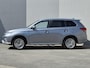 Mitsubishi Outlander 2.4 PHEV Instyle / Elektrische achterklep / Trekgewicht 1500 kg / Rondomzicht camera / Trekhaak afneembaar / Adaptief cruise control / Glazen schuif- en kanteldak / Keyless Entry/Start / Stuur-& Stoelverwarming /