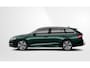 Skoda Octavia Combi 1.5 TSI MHEV Sportline Tour / 18" Lichtmetalen velgen / Panoramadak / Suite interieur design selectie cognac / Trekhaak uitklapbaar / Chrome pakket / Winter pakket / Side Assist / Light & View Pakket
