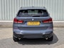 BMW X1 xDrive20i High Executive / Dealer Onderhouden / Sportstoelen / Harman & Kardon Audio / Memoryseats / HUD / Elektrische Kofferbak / Afneembare Trekhaak 2000 KG / Camera / Stoelverwarming / Cruise Control / Climate Control /