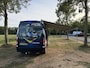 Renault Master T35 2.3 dCi 135 L3H2 Work Edition | Camper Edition | Motorsport Edition | Thule Omnistor Luifel | Airco in Leefruimte | TV | Koelkast | Magnetron | Volledig Bed | 2 Lederen Stoelen | DAB | LED Verlichting Leefruimte |