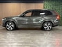 Volvo XC90 2.0 B5 AWD R-Design | Pine Grey! | Trekhaak | Adaptieve Cruise Control | Stoelverwarming | Parkeercamera | 20 Inch | Pilot Assist | Schakelpaddels aan stuurwiel | Elektrische voorstoelen geheugen | R-Design contour stoelen leder alcantara met wit stiksel en bies | Zitting verlenging voorstoelen | Lederen Dashboard | Parkeersensoren voor+achter | Privacy Glass | Elektrisch bedienbare achterklep | Geïntegreerde zongordijnen achterportieren | Verlichte instaplijsten | 7-Persoons | Apple Carplay/Android Auto | Alarm Klasse III | Volvo On Call met mobiele App functie | Pine Grey Metallic |