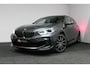 BMW 1-Serie M135i xDrive High Executive Edition / Orig. Nederlands / Panoramadak / Stoelverwarming / Apple Carplay - Android Auto / Ambienteverlichting / HUD / Achteruitrijcamera / Cruise Control / 19'' LMV / Spiegel-pakket / LED koplampen / Lederen bekleding