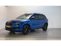 Skoda Karoq 1.5 TSI 150pk ACT Sportline Business Camera Trekhaak Sfeerverlichting Stoelverwarming Adaptive Cruise LED