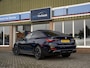 BMW i4 M50 High Executive 84 kWh | Bosch SOH-test 100%! | Pano | Memory stoel | Leder | M Stoelen | HuD | Comfort Access | Carbon Fibre int. | Tansanit Blau | 19" Y-spaak 859M wielen | Alarm kl.3