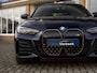 BMW i4 M50 High Executive 84 kWh | Bosch SOH-test 100%! | Pano | Memory stoel | Leder | M Stoelen | HuD | Comfort Access | Carbon Fibre int. | Tansanit Blau | 19" Y-spaak 859M wielen | Alarm kl.3