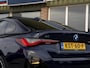 BMW i4 M50 High Executive 84 kWh | Bosch SOH-test 100%! | Pano | Memory stoel | Leder | M Stoelen | HuD | Comfort Access | Carbon Fibre int. | Tansanit Blau | 19" Y-spaak 859M wielen | Alarm kl.3