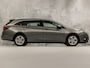 Opel Astra Sports Tourer 1.4 Turbo Innovation Sport 150Pk Automaat (APPLE CARPLAY, NAVIGATIE, CAMERA, STUUR/STOELVERWARMING, SPORTSTOELEN, ADAPTIVE CRUISE, LM VELGEN, NIEUWSTAAT)