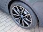 BMW i4 eDrive40 High Executive 84 kWh | SOH 92% | Dravit grau | Btw auto! | Schuifdak | HUD