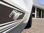 Ford Mustang Fastback 2.3 EcoBoost / 317 PK / Automaat / Race-Striping / Borla Performance sport-uitlaat / Vol-lederen stoelen mét verwarming en koeling / Keyless entry / Schakelflippers stuurwiel / Xenon lampen / Dynamische knipperlichten achter / Climate Control / Cruise Control / Bluetooth Tel + Media / Stuurwielbediening / Shaker Audiosysteem / Achteruitrij-camera + PDC achter / ETC.
