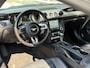 Ford Mustang Fastback 2.3 EcoBoost / 317 PK / Automaat / Race-Striping / Borla Performance sport-uitlaat / Vol-lederen stoelen mét verwarming en koeling / Keyless entry / Schakelflippers stuurwiel / Xenon lampen / Dynamische knipperlichten achter / Climate Control / Cruise Control / Bluetooth Tel + Media / Stuurwielbediening / Shaker Audiosysteem / Achteruitrij-camera + PDC achter / ETC.