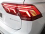 Volkswagen Tiguan 1.4 TSI eHybrid R-Line Business 245 pk Automaat (DSG) | Navigatie | Panoramadak | Trekhaak (wegklapbaar) | Parkeersensoren (Park assist) | Achteruitrijcamera | Lederen bekleding | Elektr. voorstoelen met geheugen | R-Line |