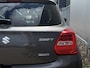 Suzuki Swift 1.2 Style Smart Hybrid | Trekhaak | Carplay | Camera | Adaptive Cruise Control | Stoelverwarming | Keyless |