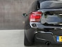 BMW 1-Serie M135i High Executive | Orgineel NL | Navigatie | Leder | Cruise control | Xenon |