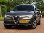 Alfa Romeo Stelvio 2.0 T AWD Velocest. | Carplay!! | Flippers | Uniek-netjes! | Donkere hemelbekl.