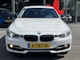 BMW 3-Serie 320i Executive | Stoelverwarming | Navi | Trekhaak