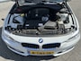 BMW 3-Serie 320i Executive | Stoelverwarming | Navi | Trekhaak