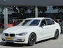 BMW 3-Serie 320i Executive | Stoelverwarming | Navi | Trekhaak